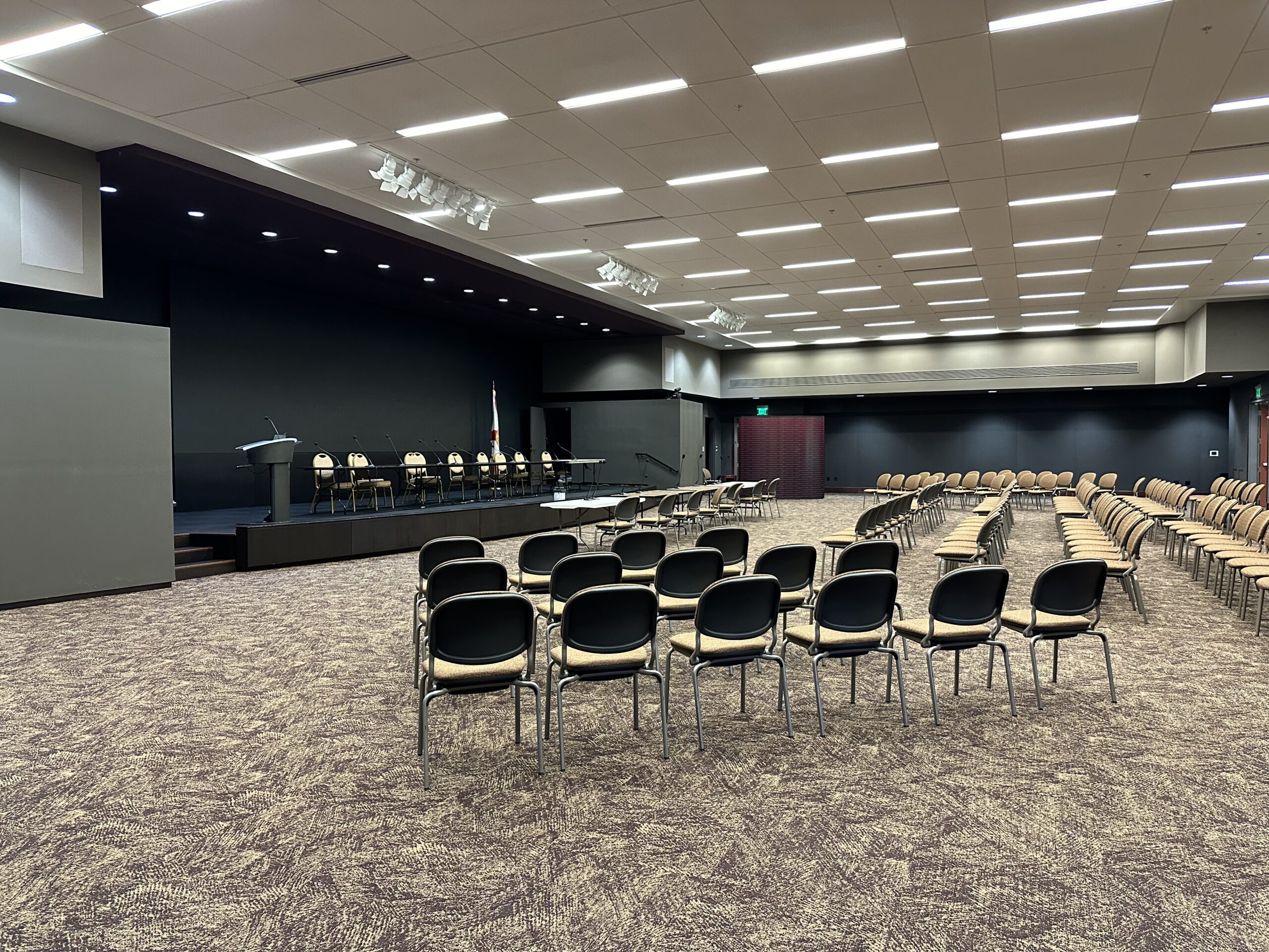 Room 208 with theatre-style seating and stage