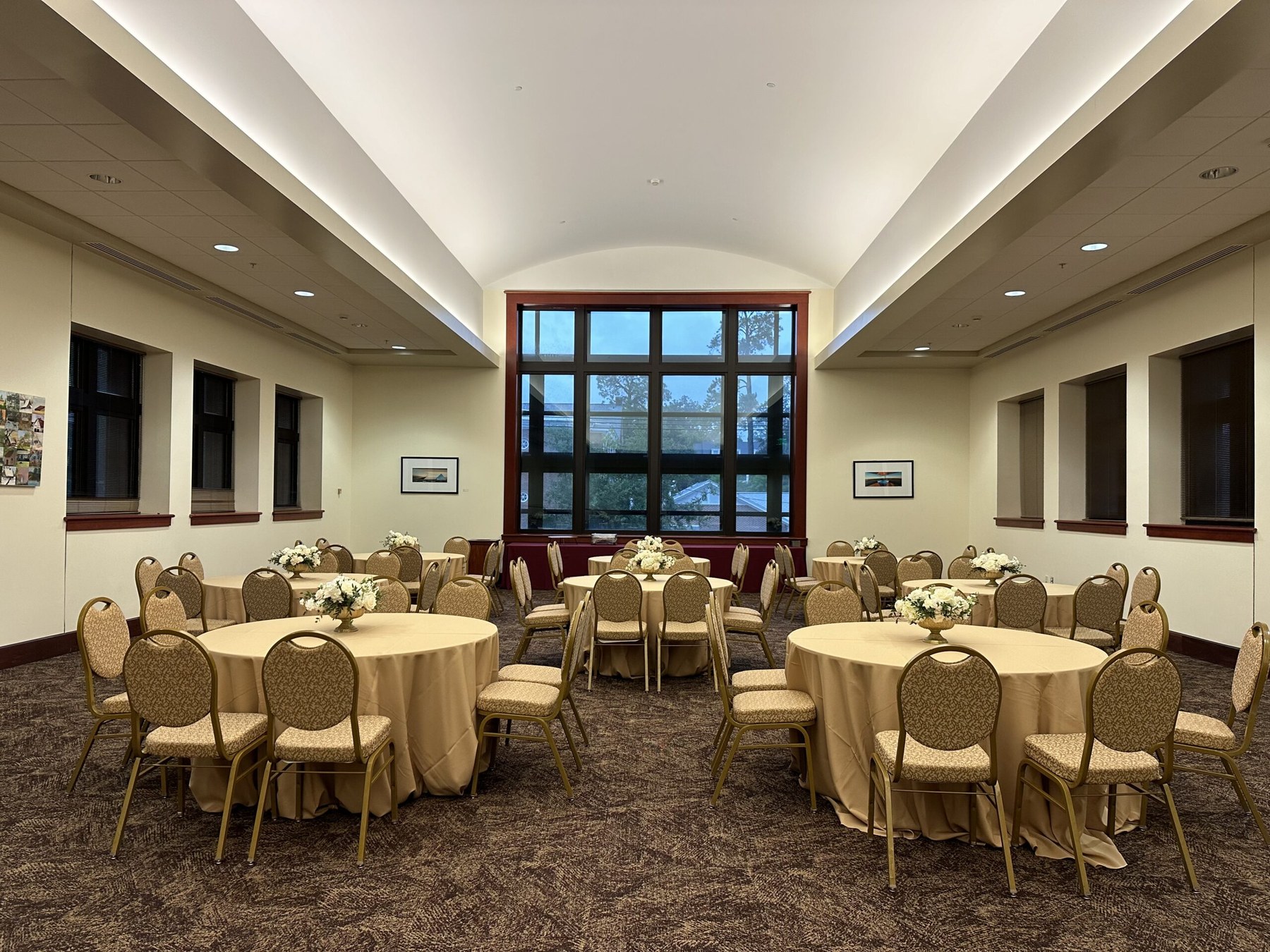 Atrium banquet setup facing the large windows