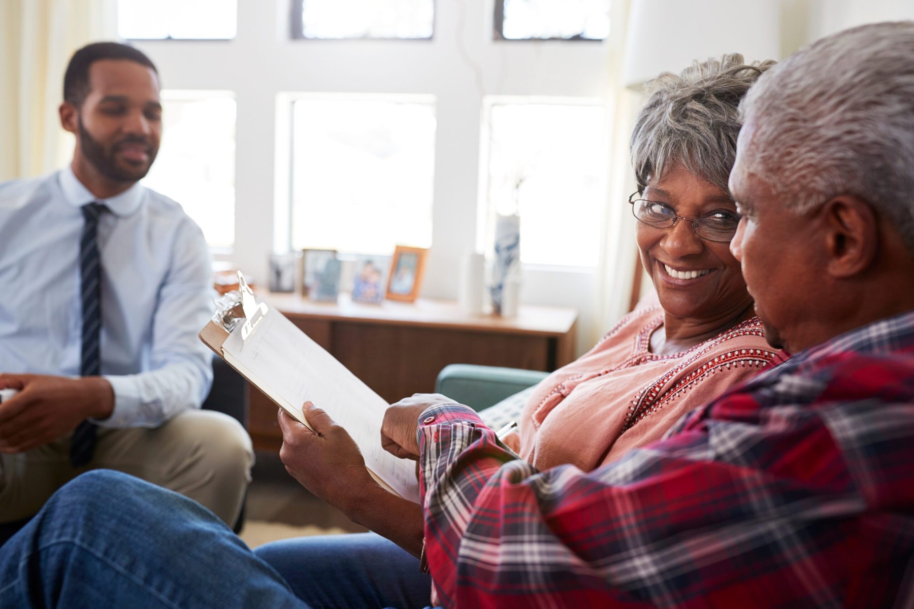 Retired couple meeting with financial advisor